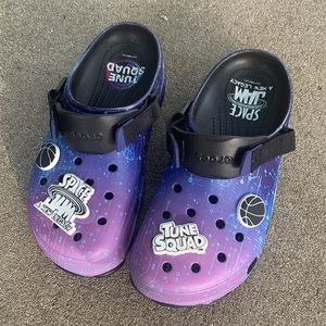 black and purple Space Jam crocs.